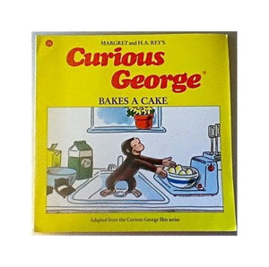 Curious George Bakes a Cake 